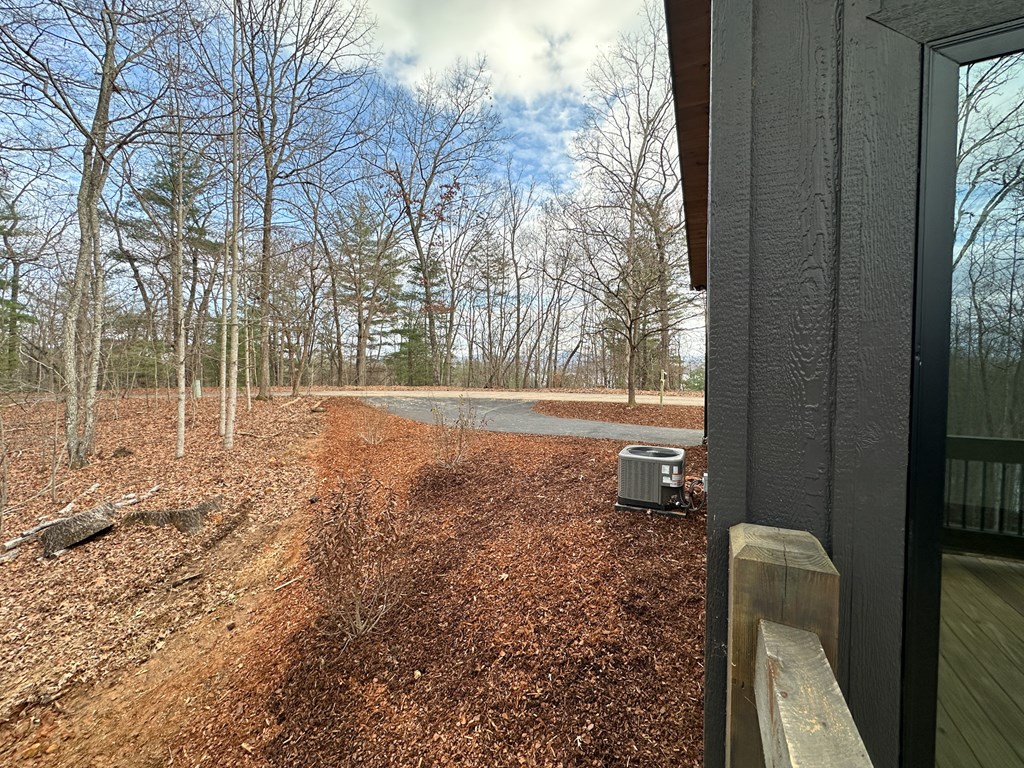 660 Old Toccoa Road Morganton, GA 30560 - Photo 13 of 45 a backyard of a house with lots of green space