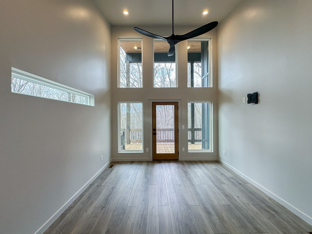 660 Old Toccoa Road Morganton, GA 30560 - Photo 20 of 45 wooden floor in an empty room with a window