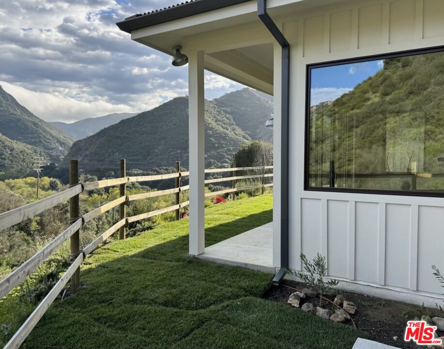 26255 Piuma Road Calabasas, CA 91302 - Photo 2 of 24 a view of a back yard from a room