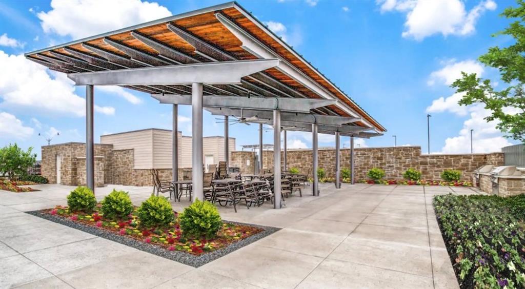 406 Madrone Lane Princeton, TX 75407 - Photo 29 of 30 Community patio featuring a wood-panelled pergola over a paved concrete surface