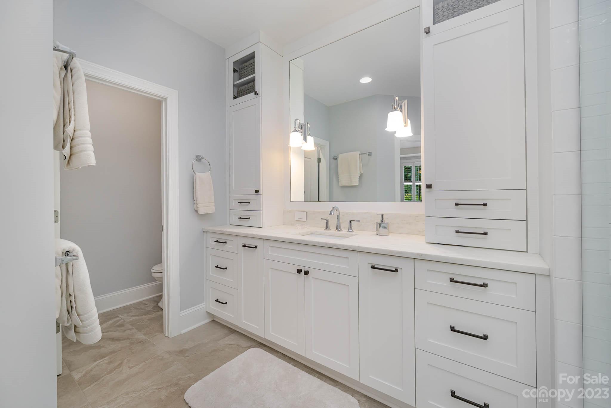 4922 Spur Ranch Road Charlotte, NC 28277 - Photo 13 of 33 a bathroom with a double vanity sink mirror and double