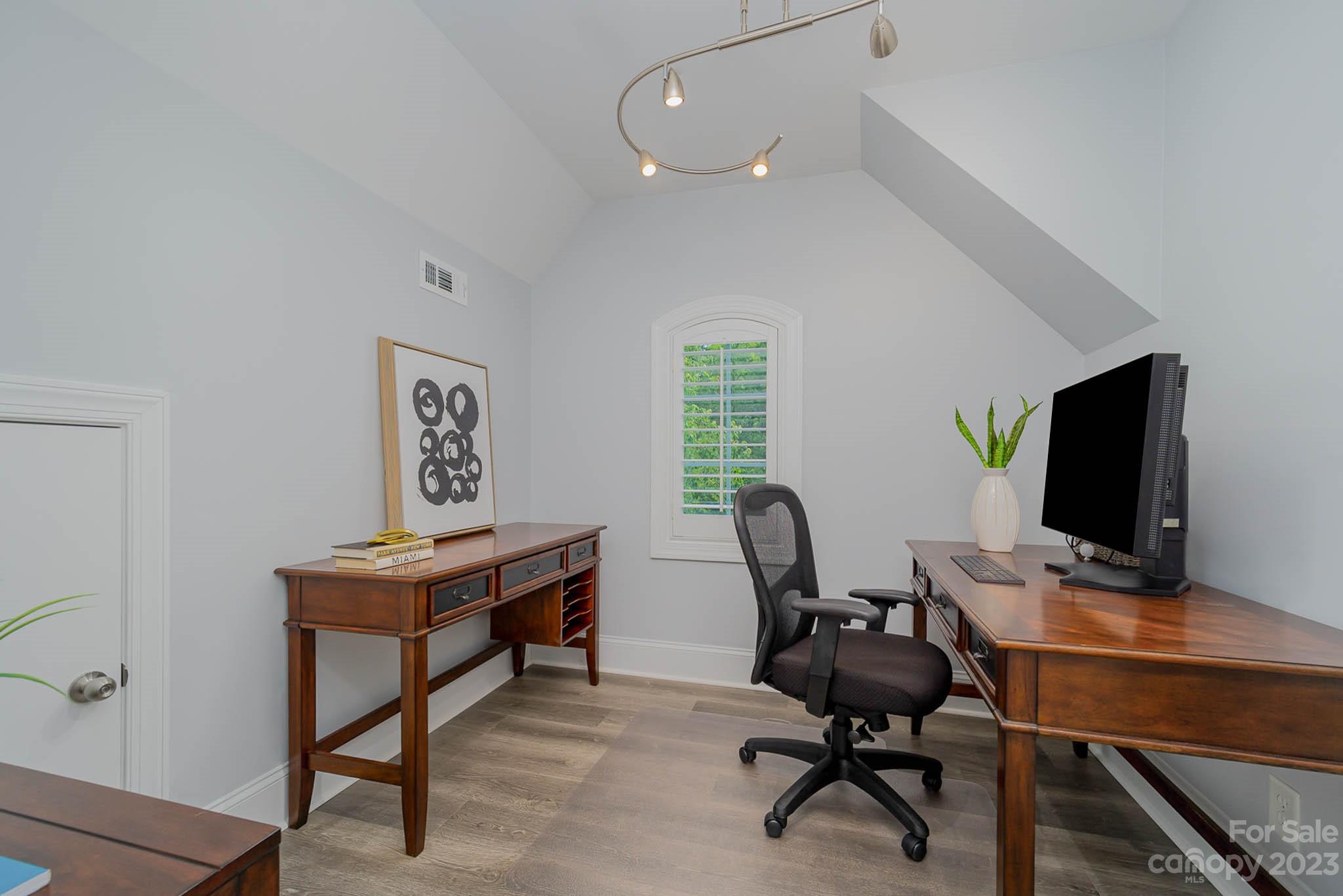 4922 Spur Ranch Road Charlotte, NC 28277 - Photo 27 of 33 a view of a workspace with furniture