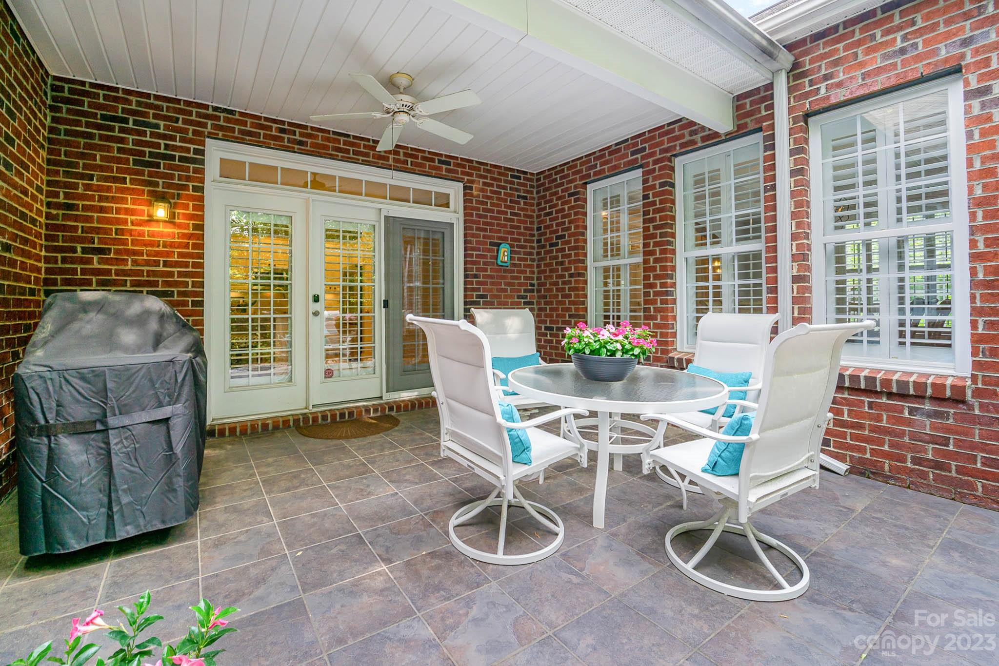 4922 Spur Ranch Road Charlotte, NC 28277 - Photo 28 of 33 a balcony with table and chairs