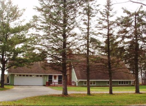 7940 Gurler Road DeKalb, IL 60115 - Photo 1 of 16 a view of a house with a yard