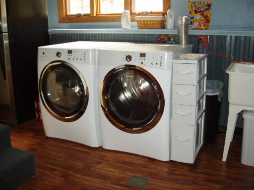 7940 Gurler Road DeKalb, IL 60115 - Photo 11 of 16 a utility room with dryer and washer