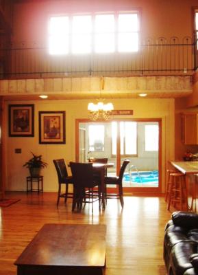 7940 Gurler Road DeKalb, IL 60115 - Photo 13 of 16 a view of a dining room with furniture window and wooden floor