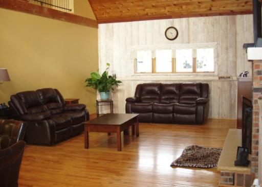 7940 Gurler Road DeKalb, IL 60115 - Photo 3 of 16 a living room with furniture and a large window