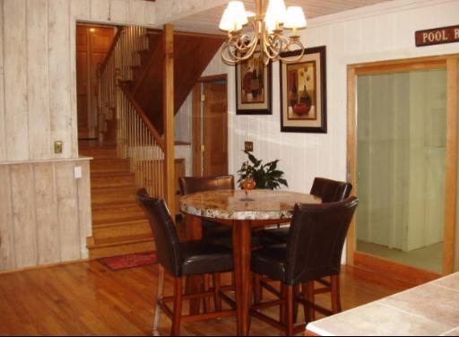 7940 Gurler Road DeKalb, IL 60115 - Photo 4 of 16 a dining room with furniture and wooden floor