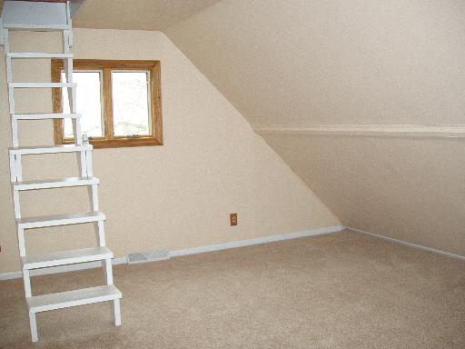 7940 Gurler Road DeKalb, IL 60115 - Photo 9 of 16 a view of an empty room with a window