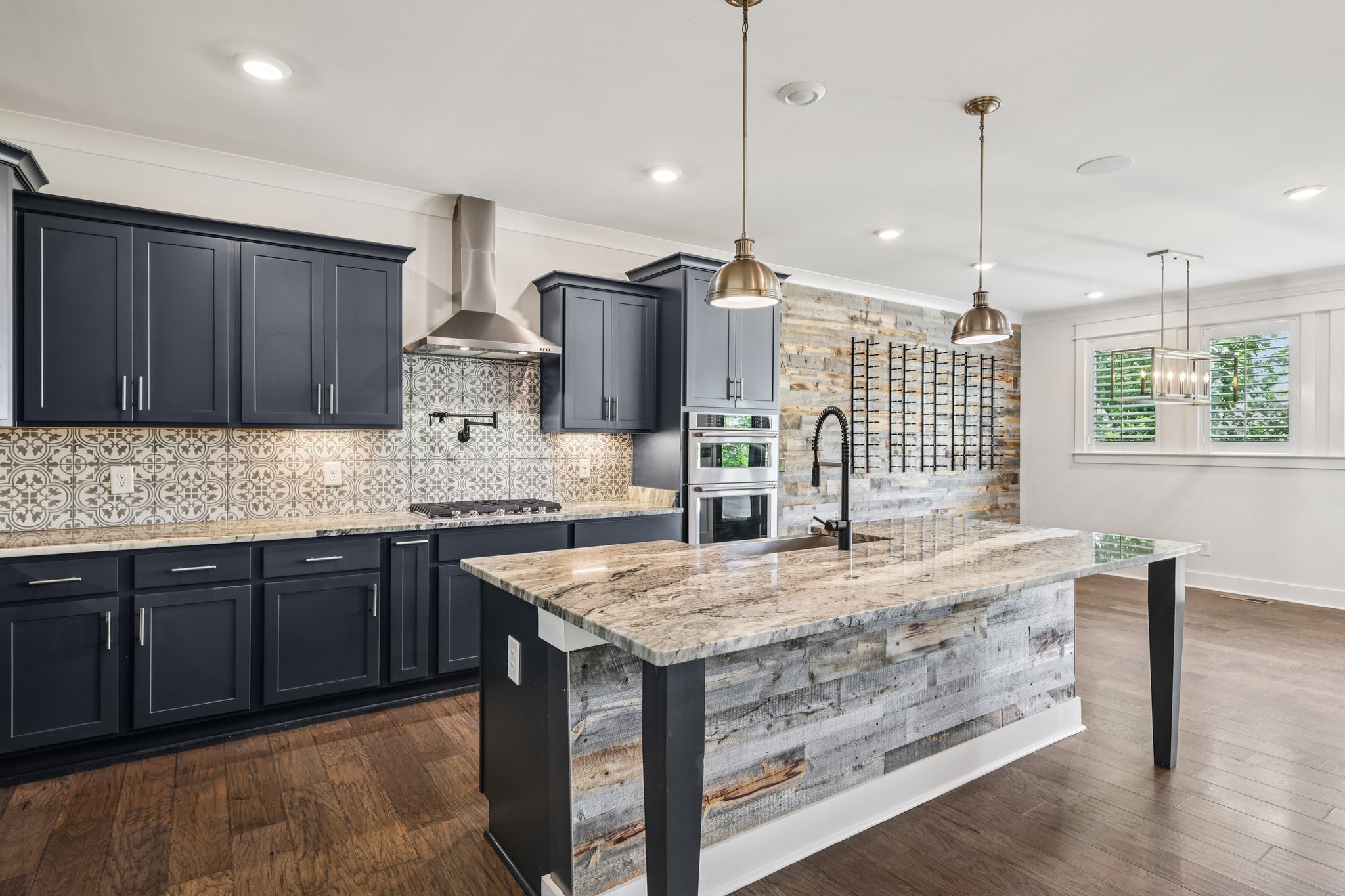 9008 Grayson Circle Mount Juliet, TN 37122 - Photo 13 of 36 a kitchen with kitchen island granite countertop wooden cabinets and a stove