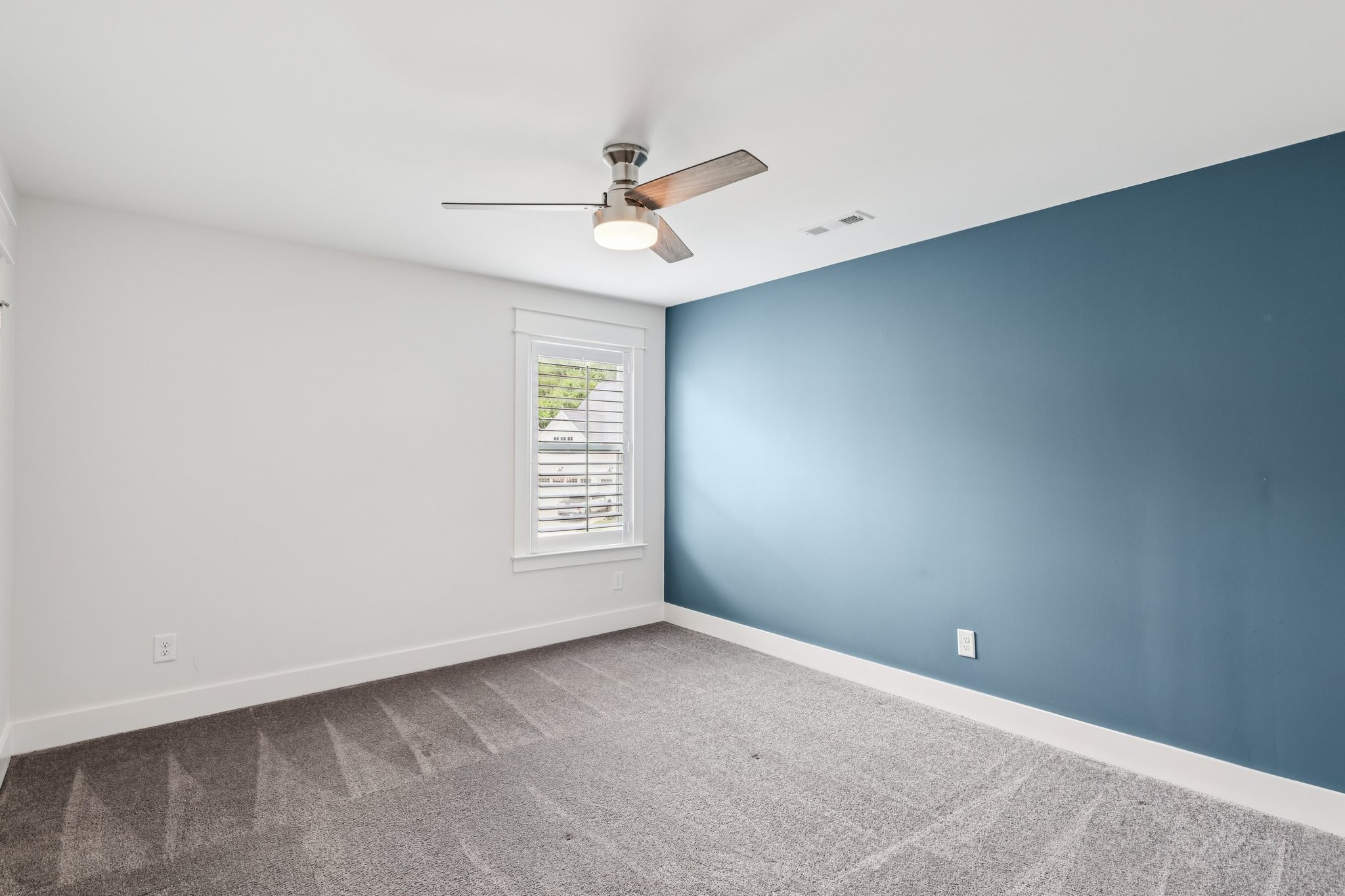 9008 Grayson Circle Mount Juliet, TN 37122 - Photo 27 of 36 an empty room with windows and fan