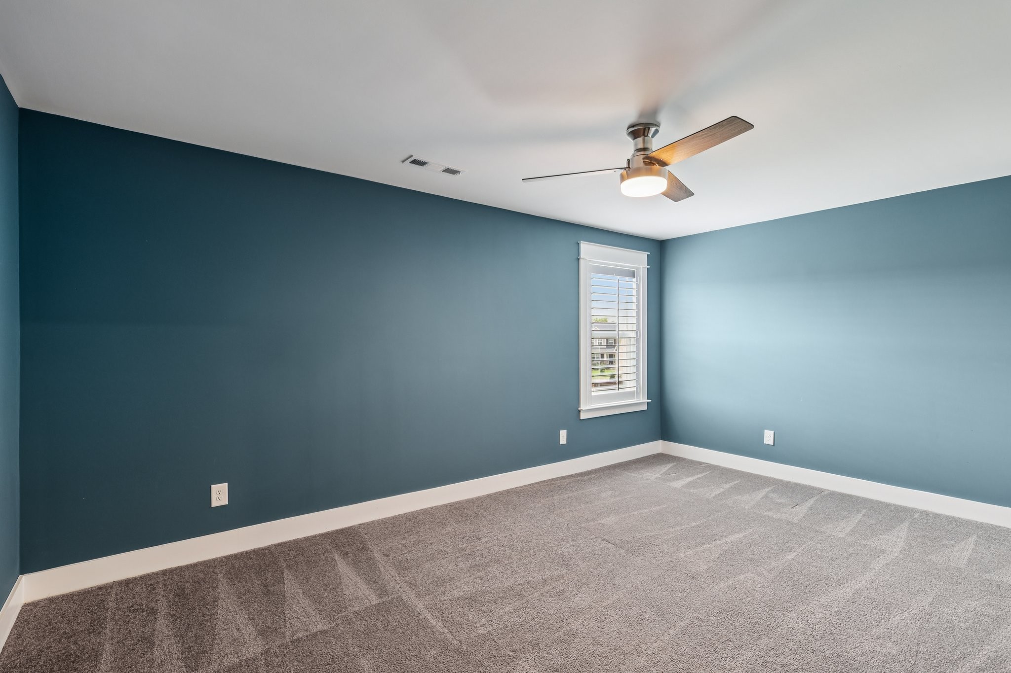 9008 Grayson Circle Mount Juliet, TN 37122 - Photo 30 of 36 an empty room with windows and fan