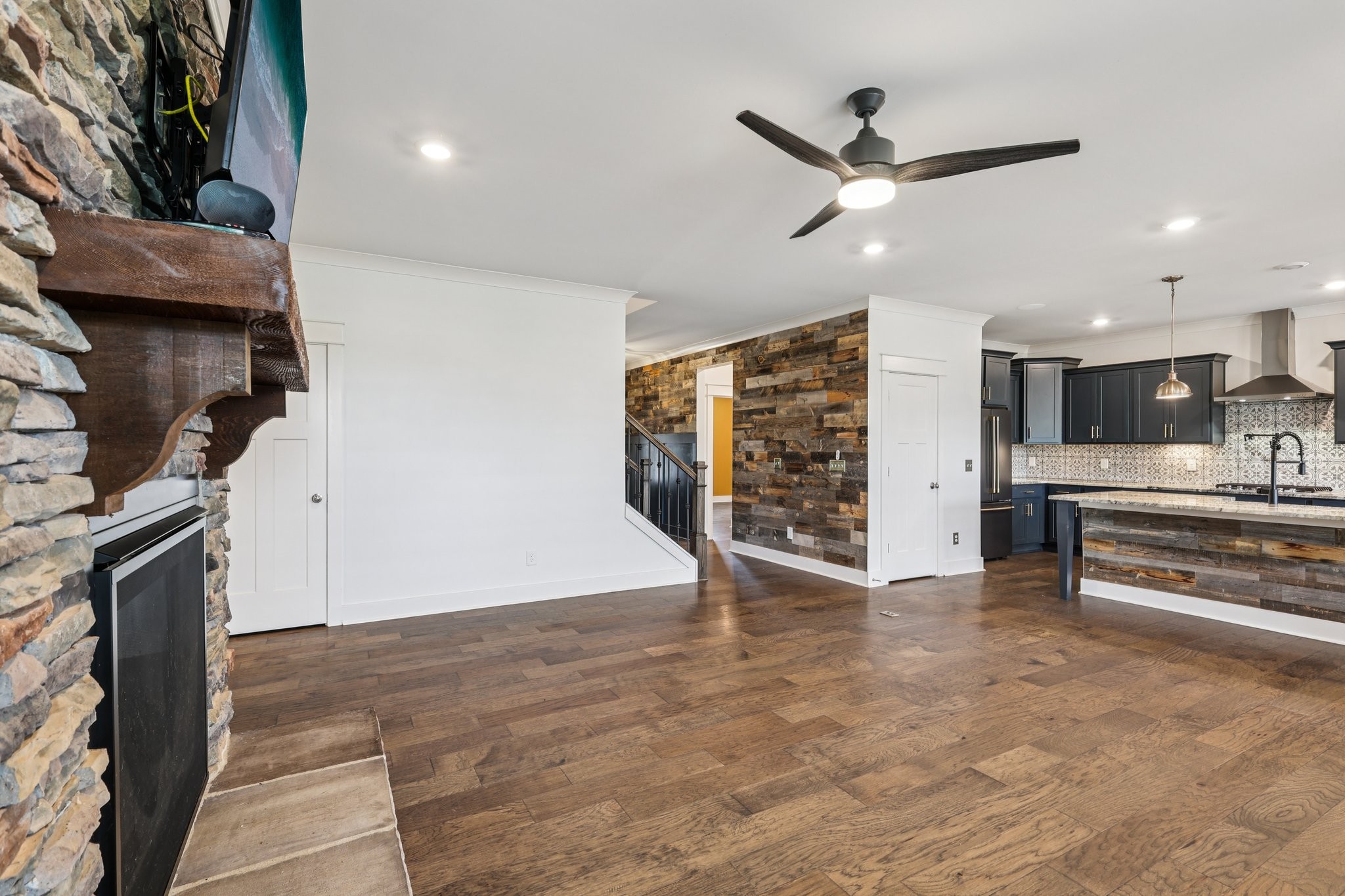 9008 Grayson Circle Mount Juliet, TN 37122 - Photo 5 of 36 an empty room with furniture and a kitchen view