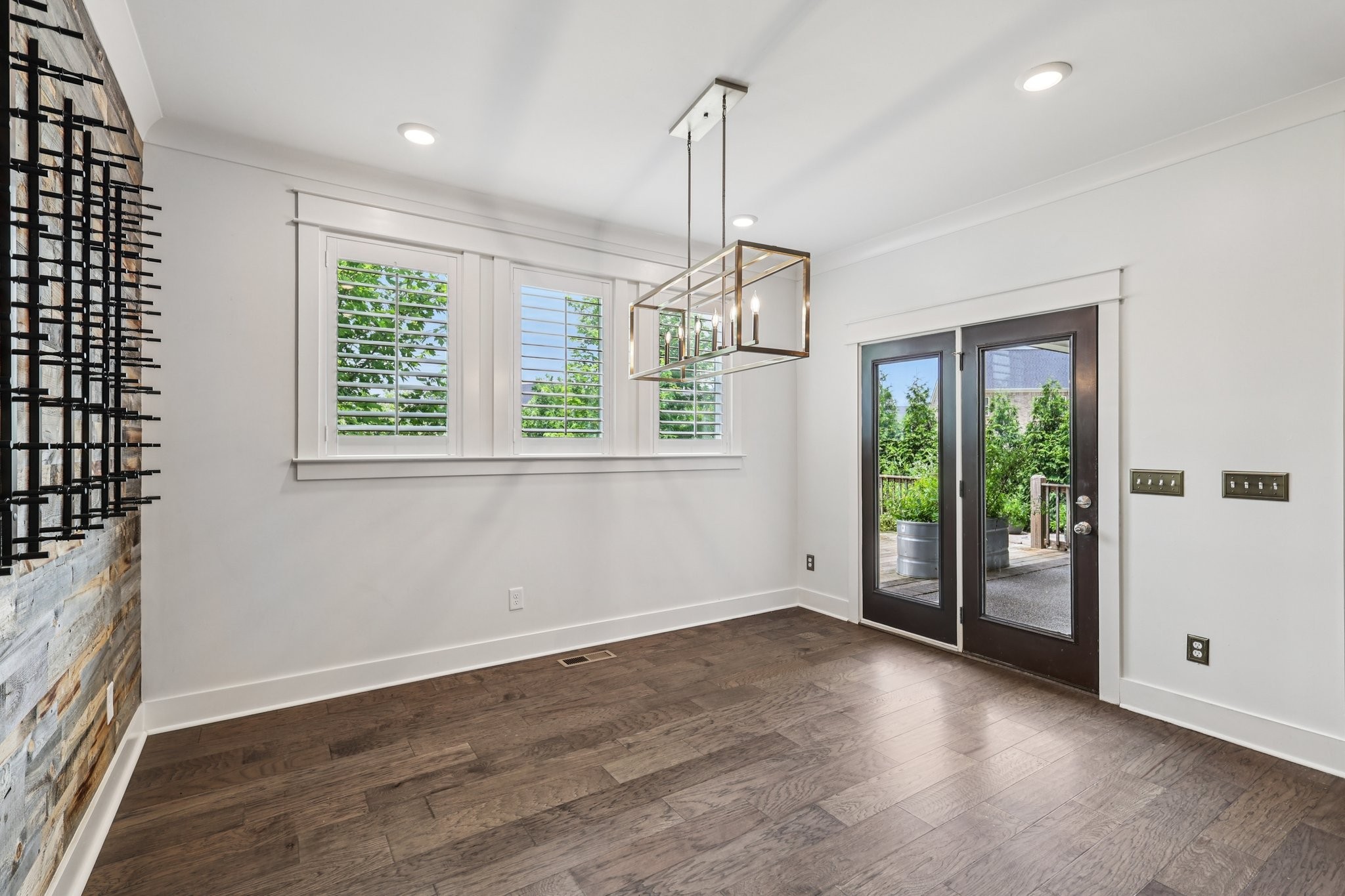 9008 Grayson Circle Mount Juliet, TN 37122 - Photo 8 of 36 an empty room with wooden floor and windows