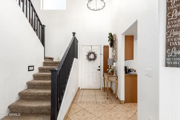 a view of an entryway with staircase