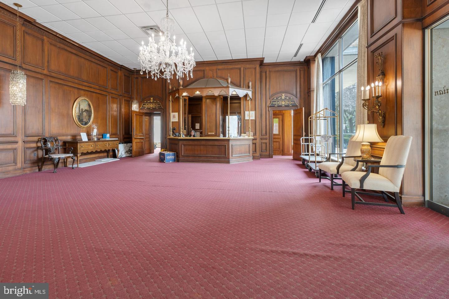 9701 Fields Road, Unit 301 Gaithersburg, MD 20878 - Photo 4 of 6 Elegant lobby with classic charm.