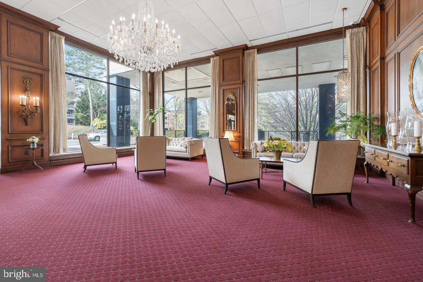 9701 Fields Road, Unit 301 Gaithersburg, MD 20878 - Photo 5 of 6 Elegant lobby with grand chandelier.
