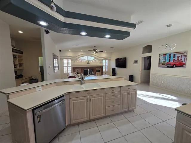 a room with pool table and couch