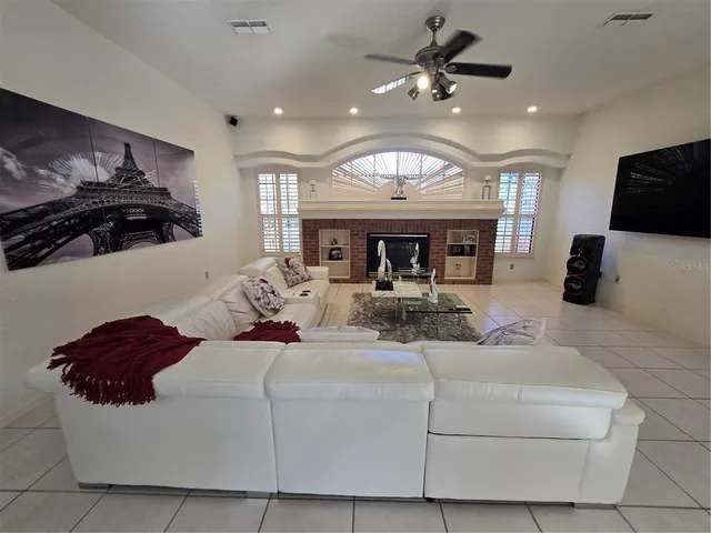 a kitchen with a refrigerator and a window