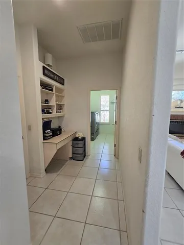 a utility room with a sink washer and dryer