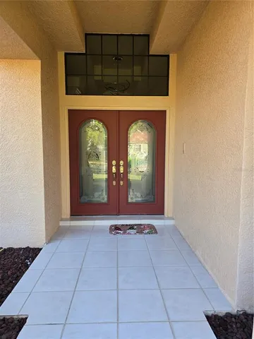 a view of a entryway door with an entryway
