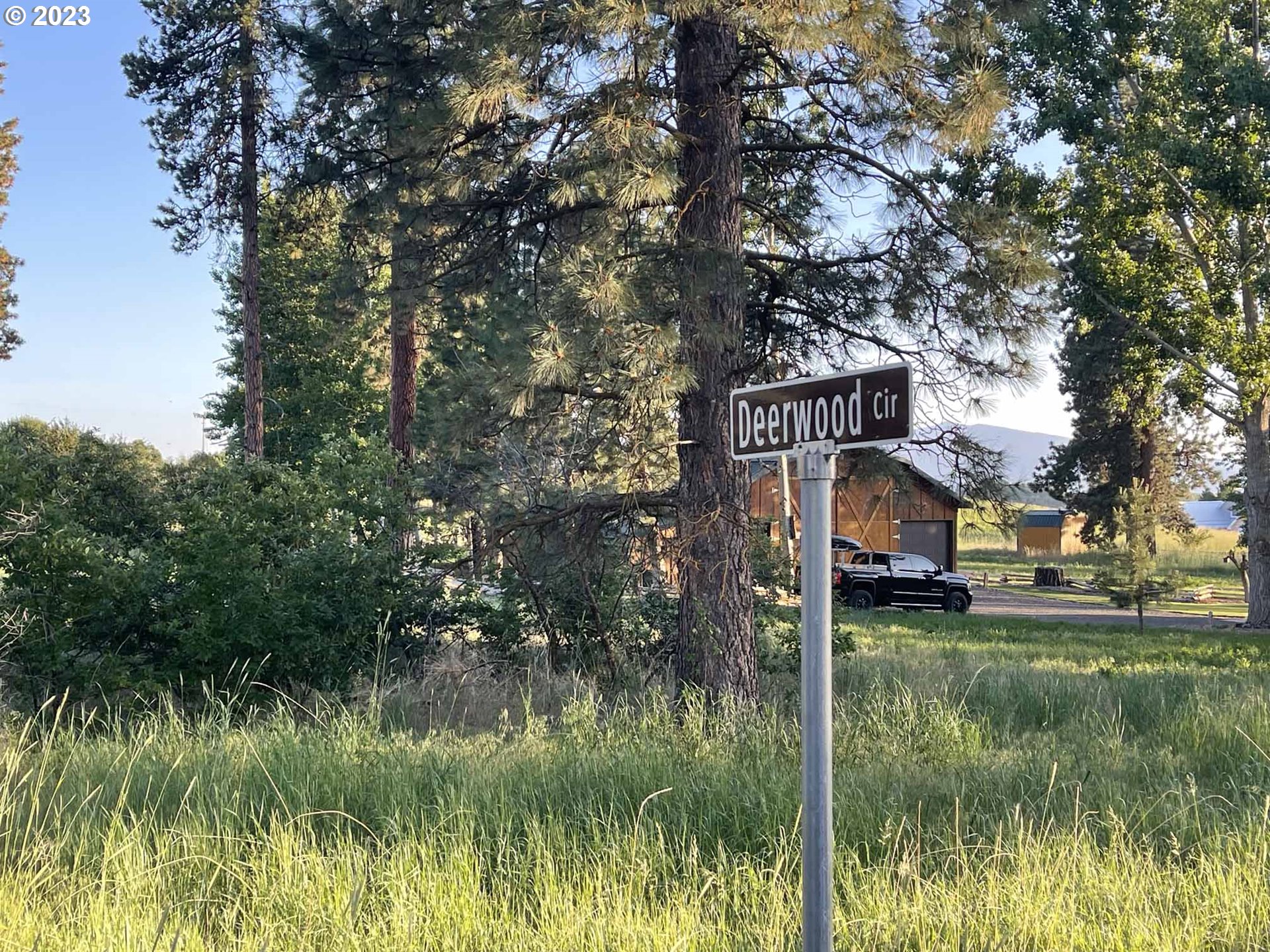 Twin Lakes Road, Unit 3 Chiloquin, OR 97624 - Photo 11 of 12 a view of residential houses with yard and swimming pool