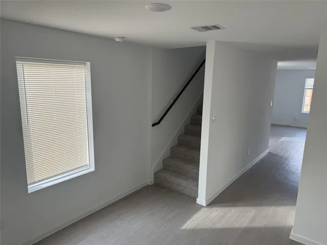 an empty room with windows