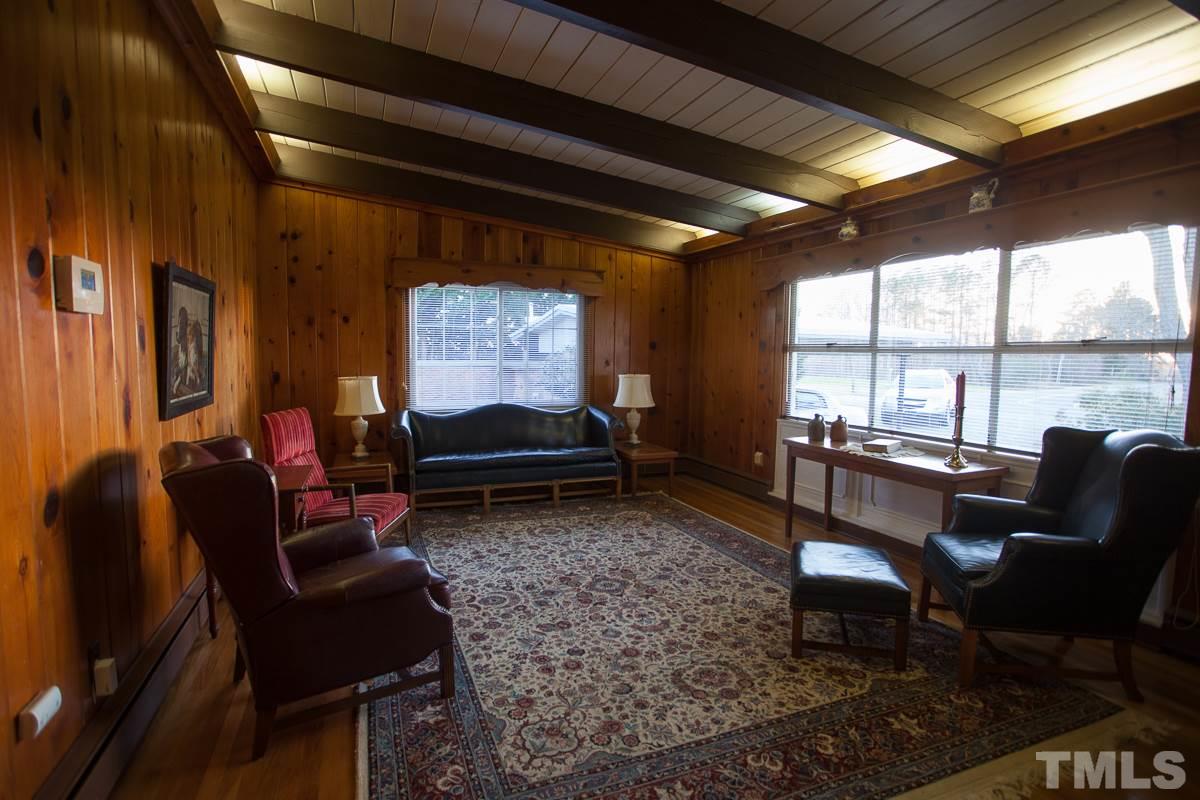 245 Weldon Wrenn Road Roxboro, NC 27574 - Photo 22 of 25 a living room with furniture and a large window