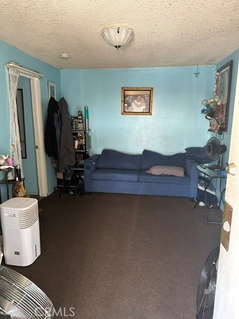 201 West Raymond Street Compton, CA 90220 - Photo 11 of 19 a room with a table and gym equipment