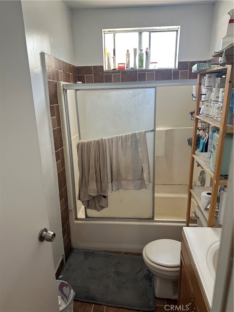 201 West Raymond Street Compton, CA 90220 - Photo 19 of 19 a bathroom with a sink toilet and shower