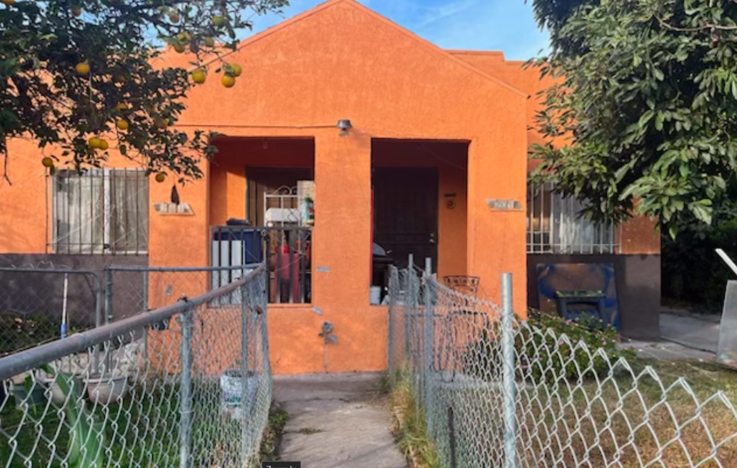 201 West Raymond Street Compton, CA 90220 - Photo 2 of 19 a view of a house with wooden fence