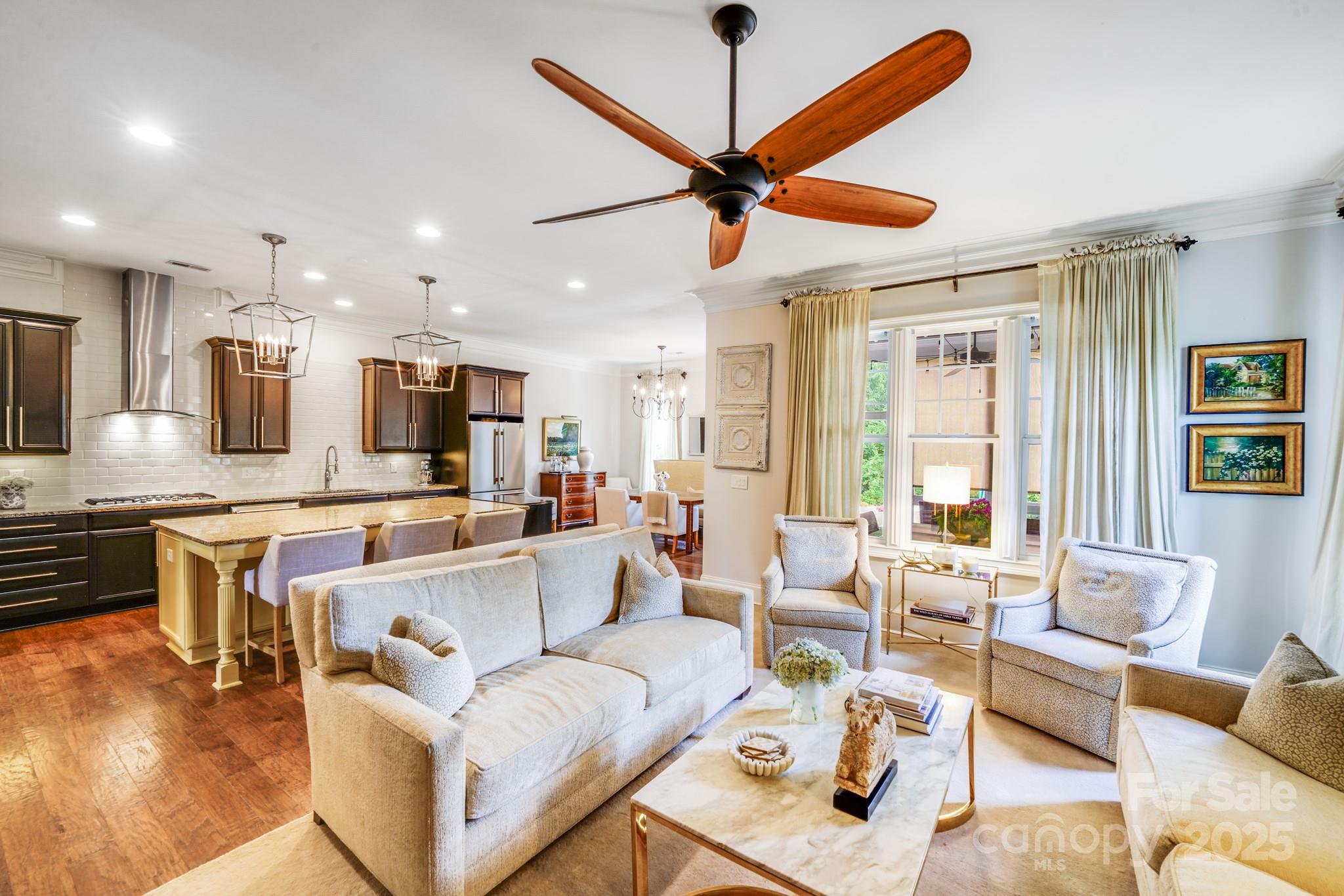 2702 Arsdale Road Waxhaw, NC 28173 - Photo 16 of 48 a living room with furniture kitchen view and a large window
