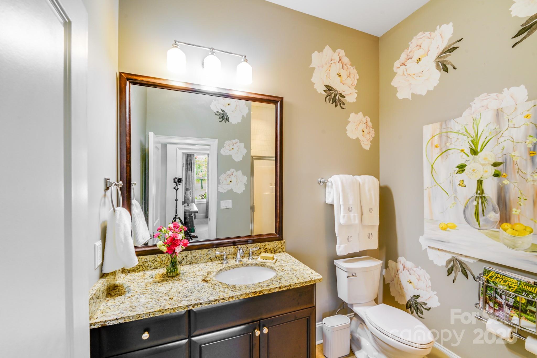 2702 Arsdale Road Waxhaw, NC 28173 - Photo 21 of 48 a bathroom with a granite countertop sink mirror and toilet