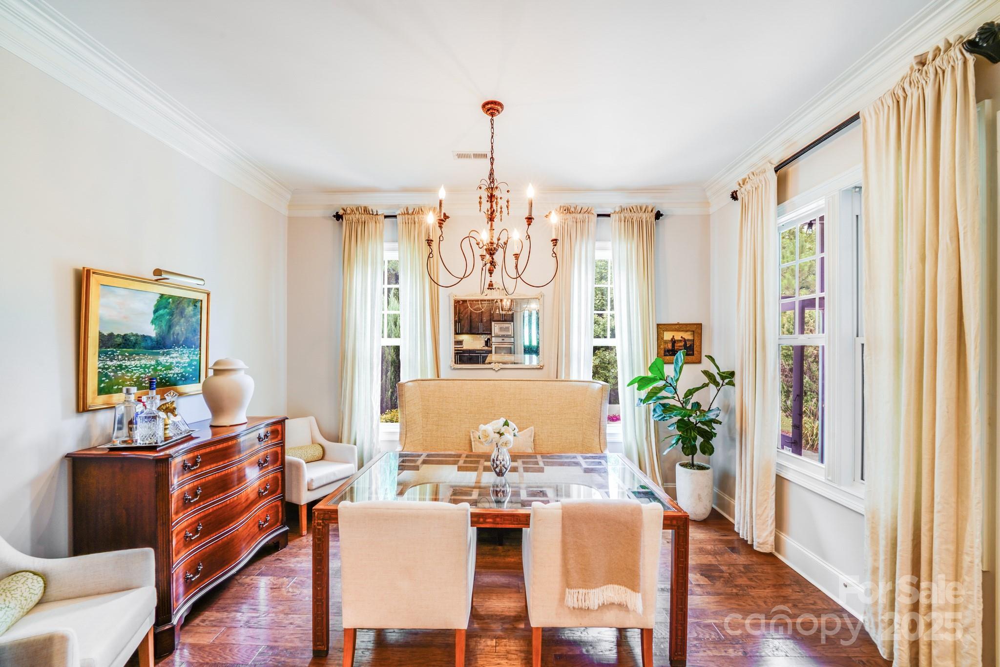 2702 Arsdale Road Waxhaw, NC 28173 - Photo 24 of 48 a view of a dining room with furniture window and wooden floor