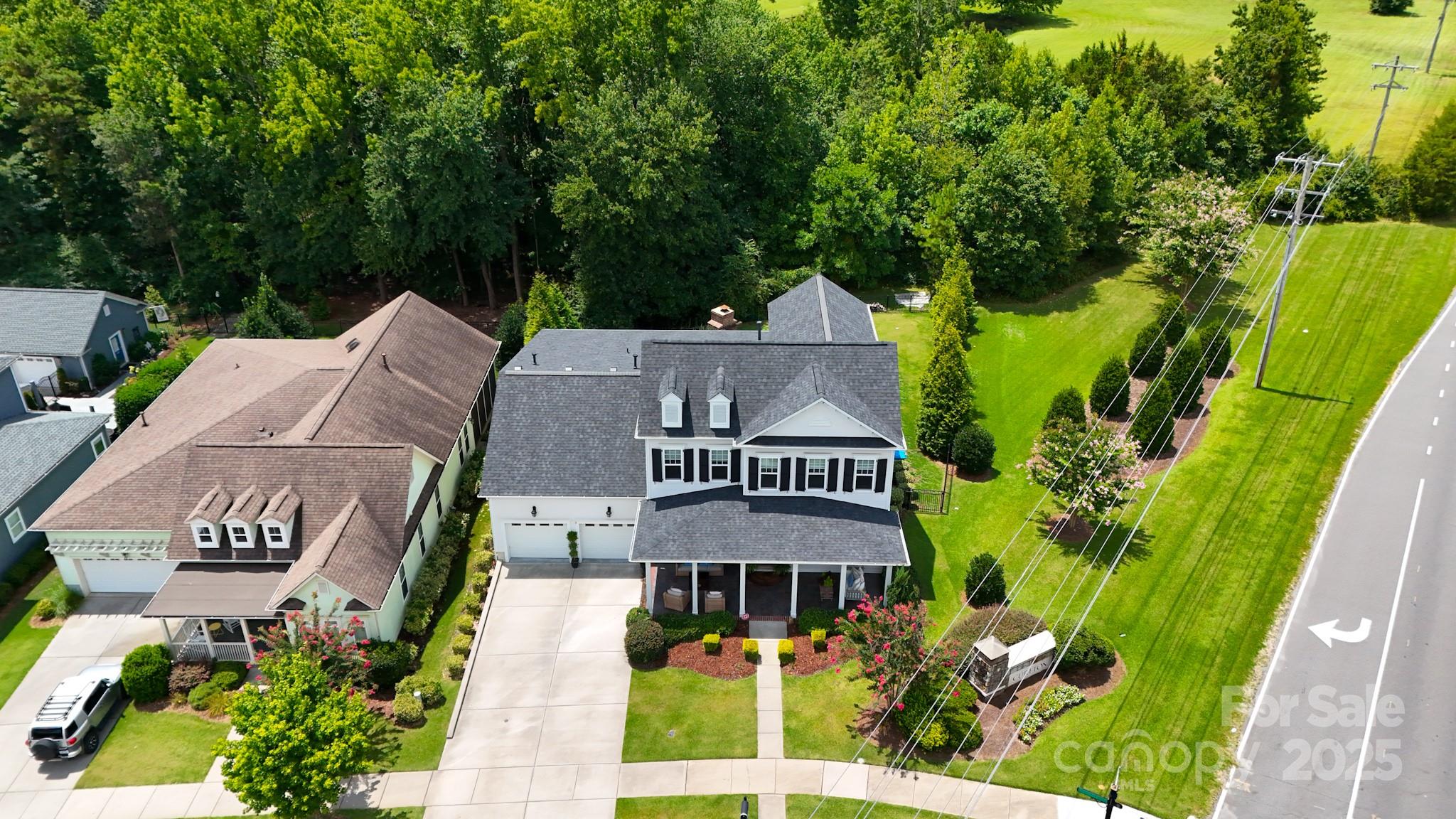 2702 Arsdale Road Waxhaw, NC 28173 - Photo 3 of 48 an aerial view of a house with a garden and plants