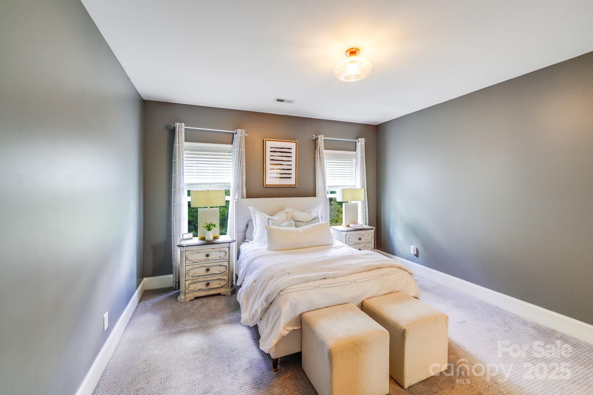 2702 Arsdale Road Waxhaw, NC 28173 - Photo 39 of 48 a bedroom with a bed and a window