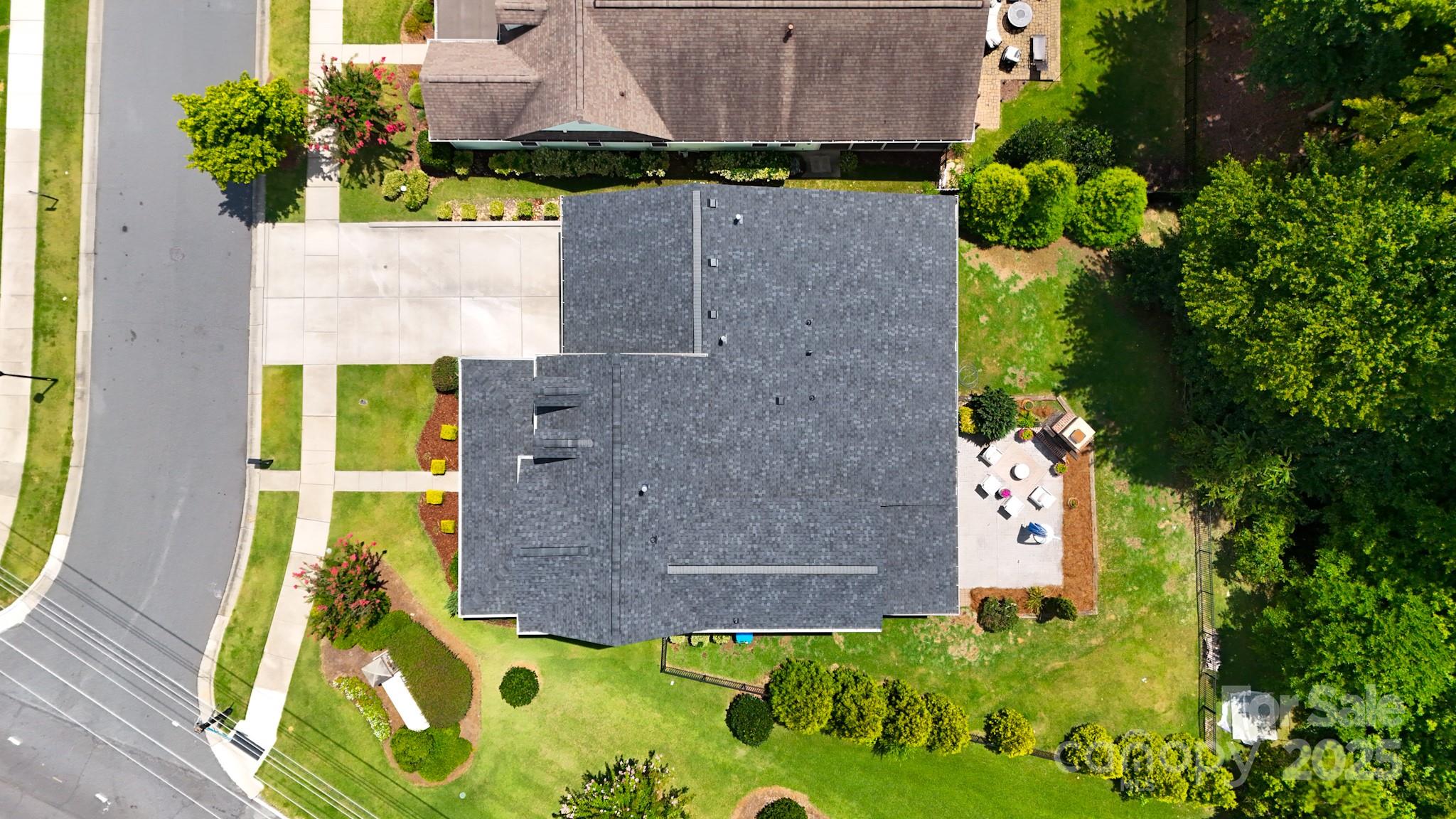 2702 Arsdale Road Waxhaw, NC 28173 - Photo 4 of 48 a aerial view of a house with a yard and potted plants