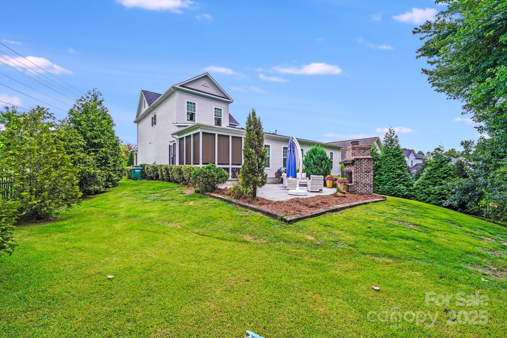 2702 Arsdale Road Waxhaw, NC 28173 - Photo 47 of 48 a swimming pool with outdoor seating and yard