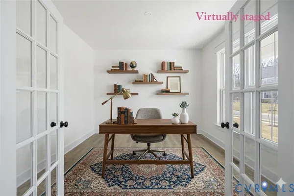 a workspace with furniture and window