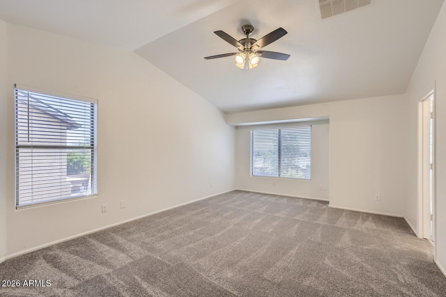 16033 West Diamond Street Goodyear, AZ 85338 - Photo 17 of 28 a view of an empty room with a window