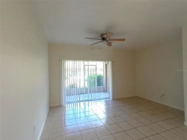 a view of an empty room and window