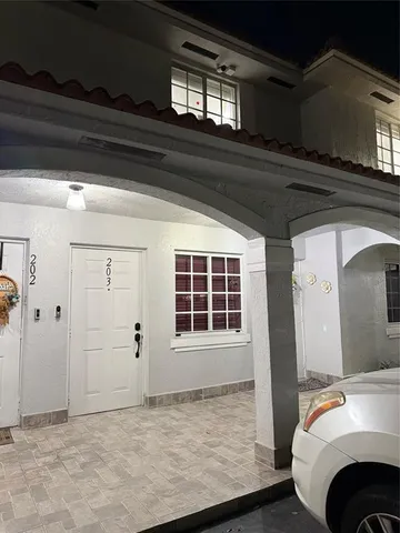 a view of livingroom with furniture and window