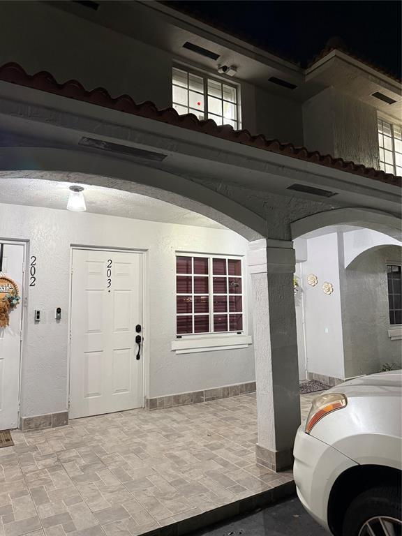 3526 West 76th Street, Unit 203 Hialeah, FL 33018 - Photo 2 of 13 a view of livingroom with furniture and window