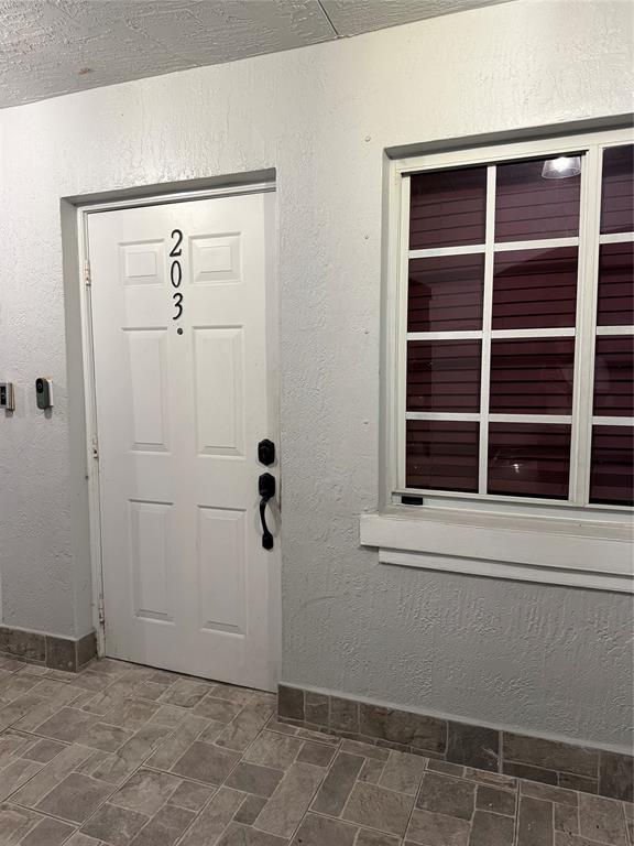 3526 West 76th Street, Unit 203 Hialeah, FL 33018 - Photo 3 of 13 a view of a front door of a house