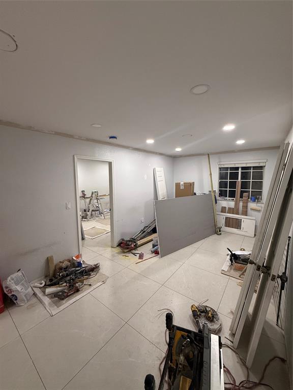 3526 West 76th Street, Unit 203 Hialeah, FL 33018 - Photo 7 of 13 a view of a workspace with furniture and a large window