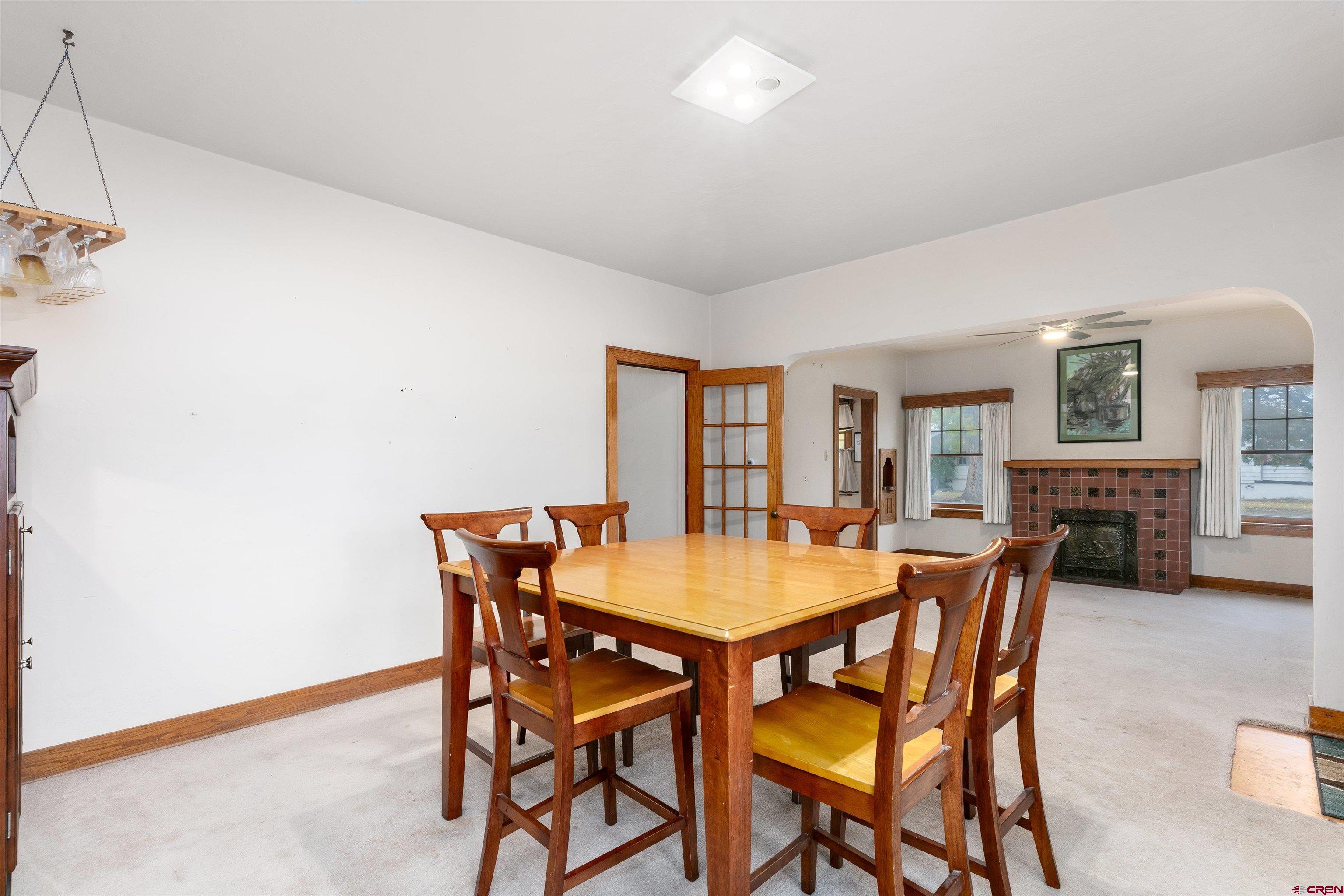 705 Oak Street Del Norte, CO 81132 - Photo 13 of 44 a dining room with furniture and window