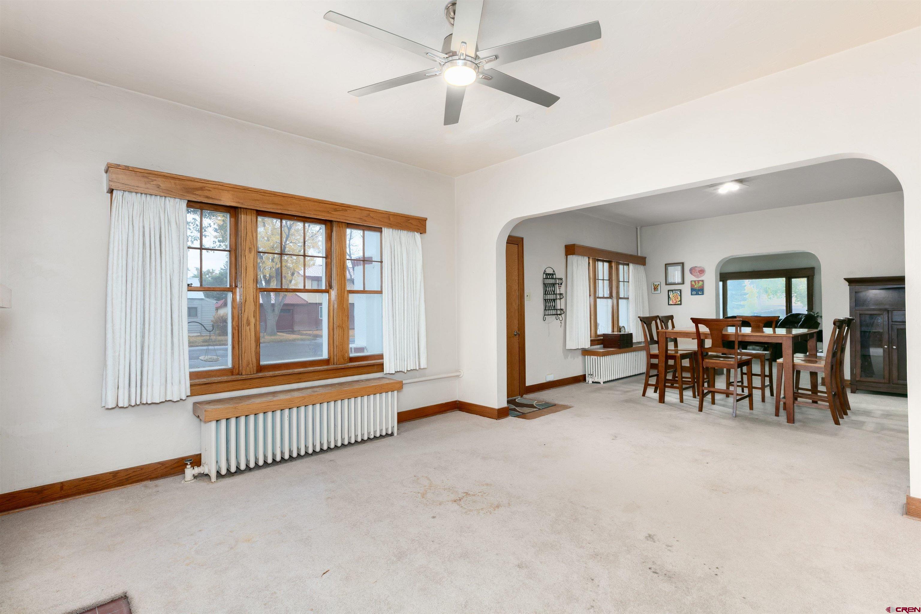 705 Oak Street Del Norte, CO 81132 - Photo 14 of 44 a view of a livingroom with furniture and a window