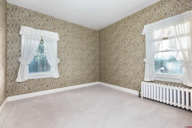 a view of storage and utility room with washer and dryer