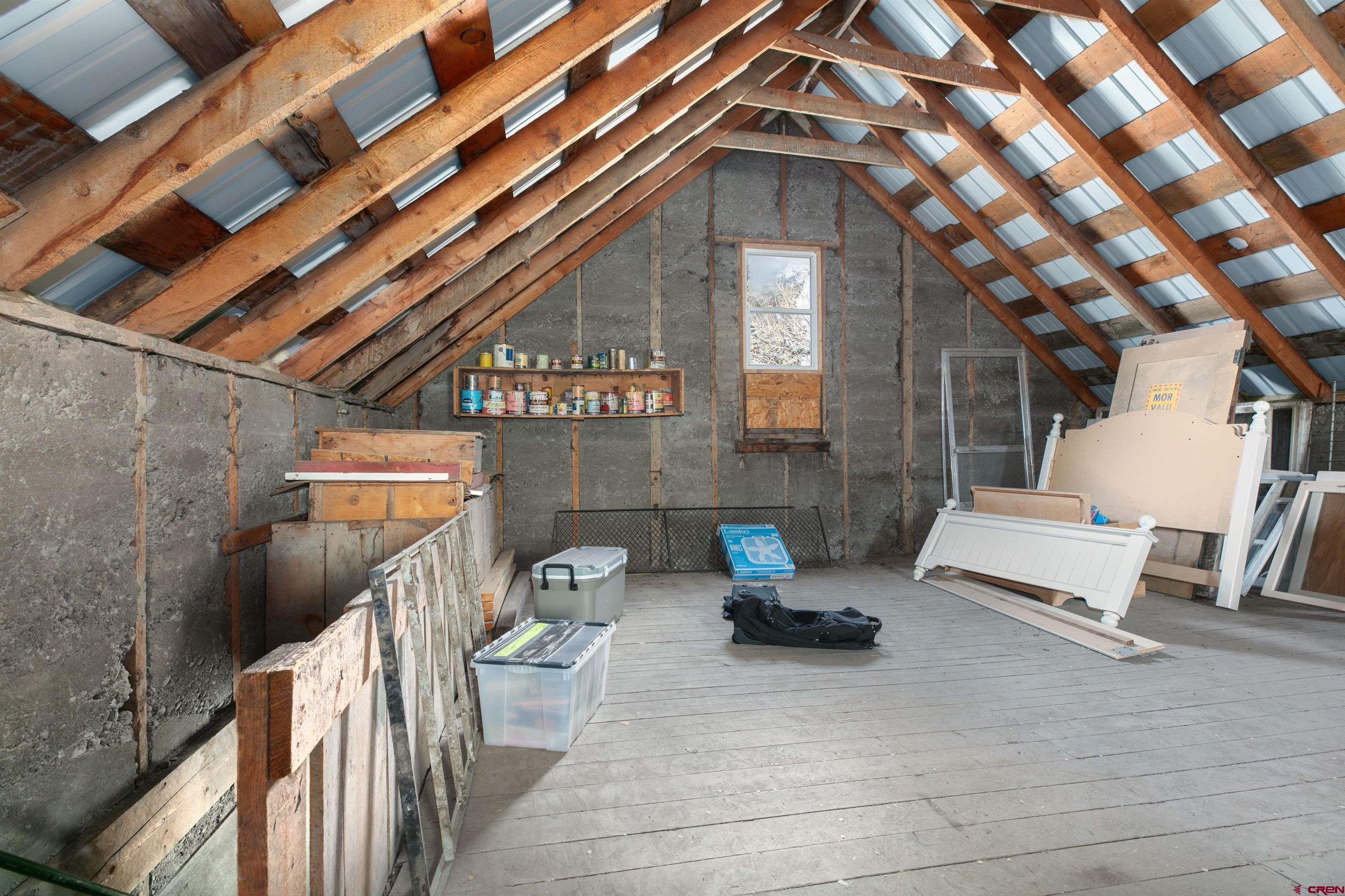705 Oak Street Del Norte, CO 81132 - Photo 35 of 44 a view of a chairs and table in backyard