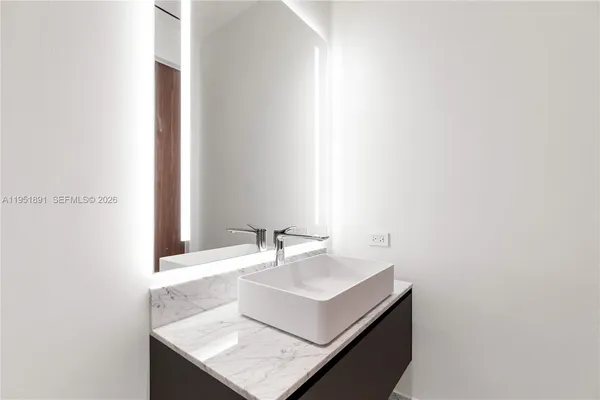 a picture of a wall with white wall painting